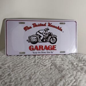 NWT The Busted Knuckle Garage Metal License Plate